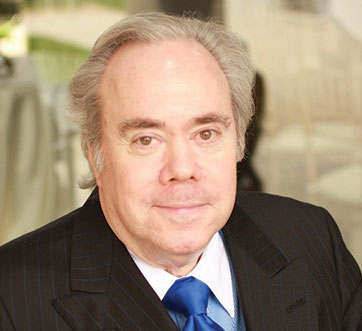 Photo of a man smiling. Link to Life Stage Gift Planner Ages 60-70 Situations.