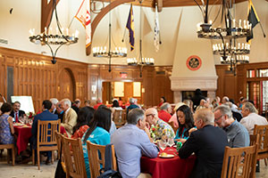 People sitting at tables People sitting at tables