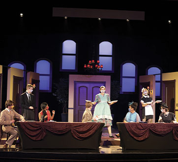 Photo of a play. Links to Gifts of Cash, Checks, and Credit Cards
